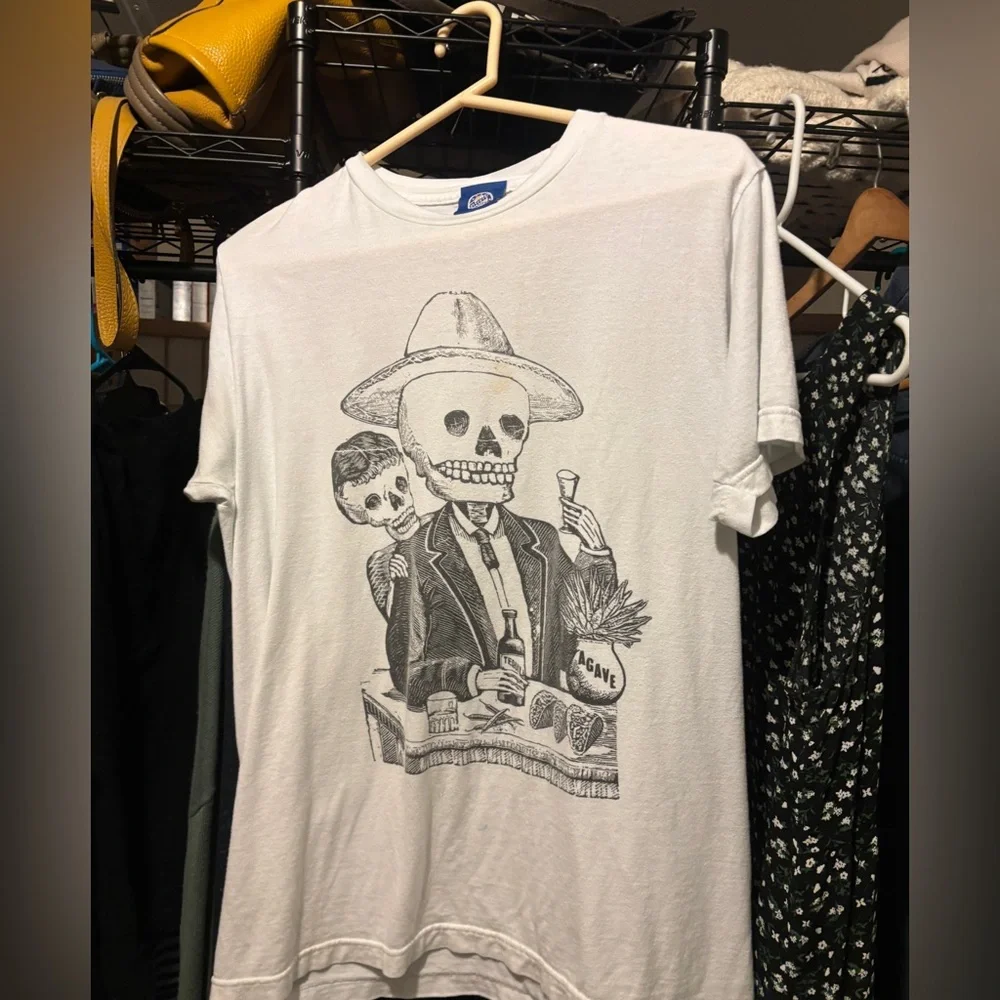 Mexican skull shirt bout at Disney’s Epcot park. - Picture 1 of 4